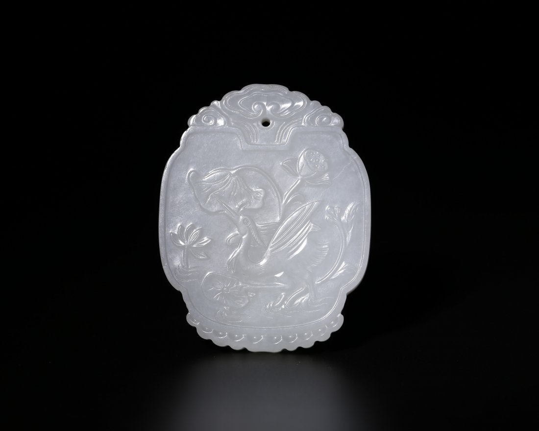 A CHINESE WHITE JADE CAVED PLAQUE (1 of 10)
