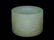 A CHINESE WHITE JADE ARCHER'S RING