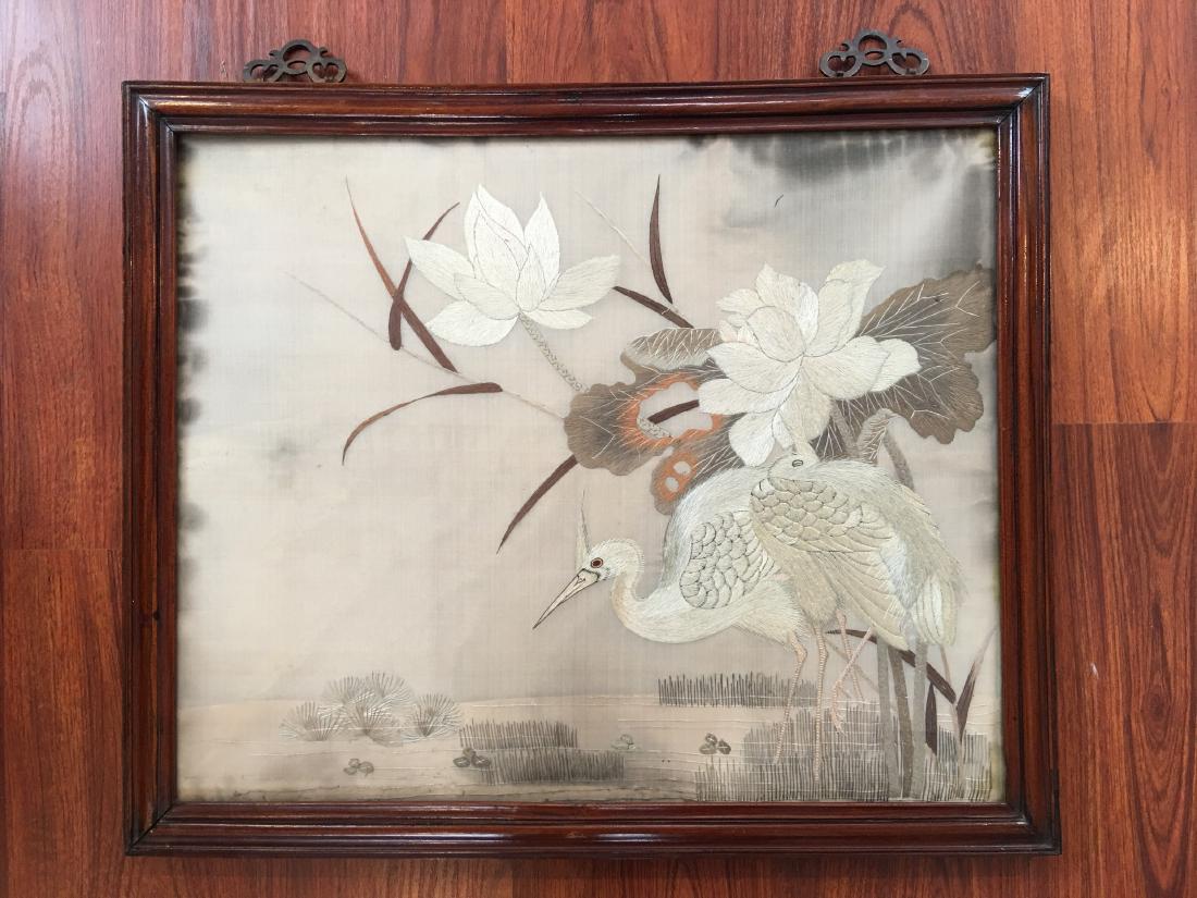 A CHINESE EMBROIDERED SILK PANEL WITH WOOD FRAME (1 of 3)