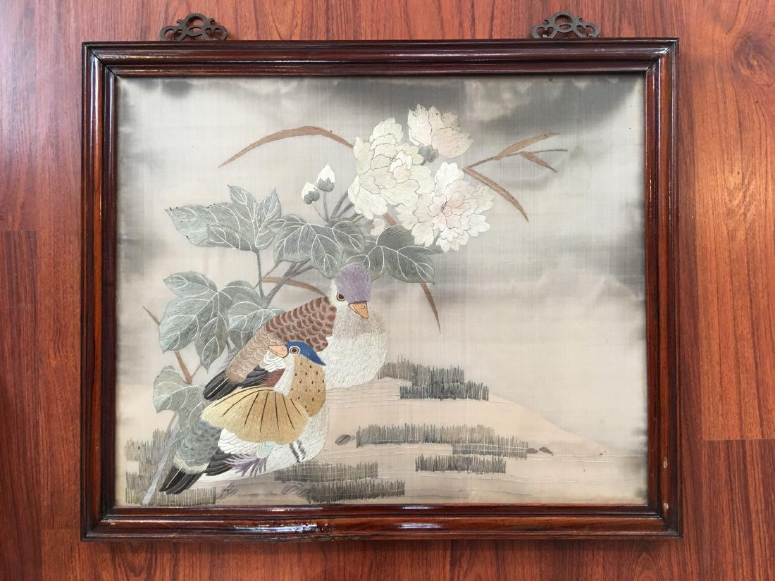 A CHINESE EMBROIDERED SILK PANEL WITH WOOD FRAME (1 of 4)