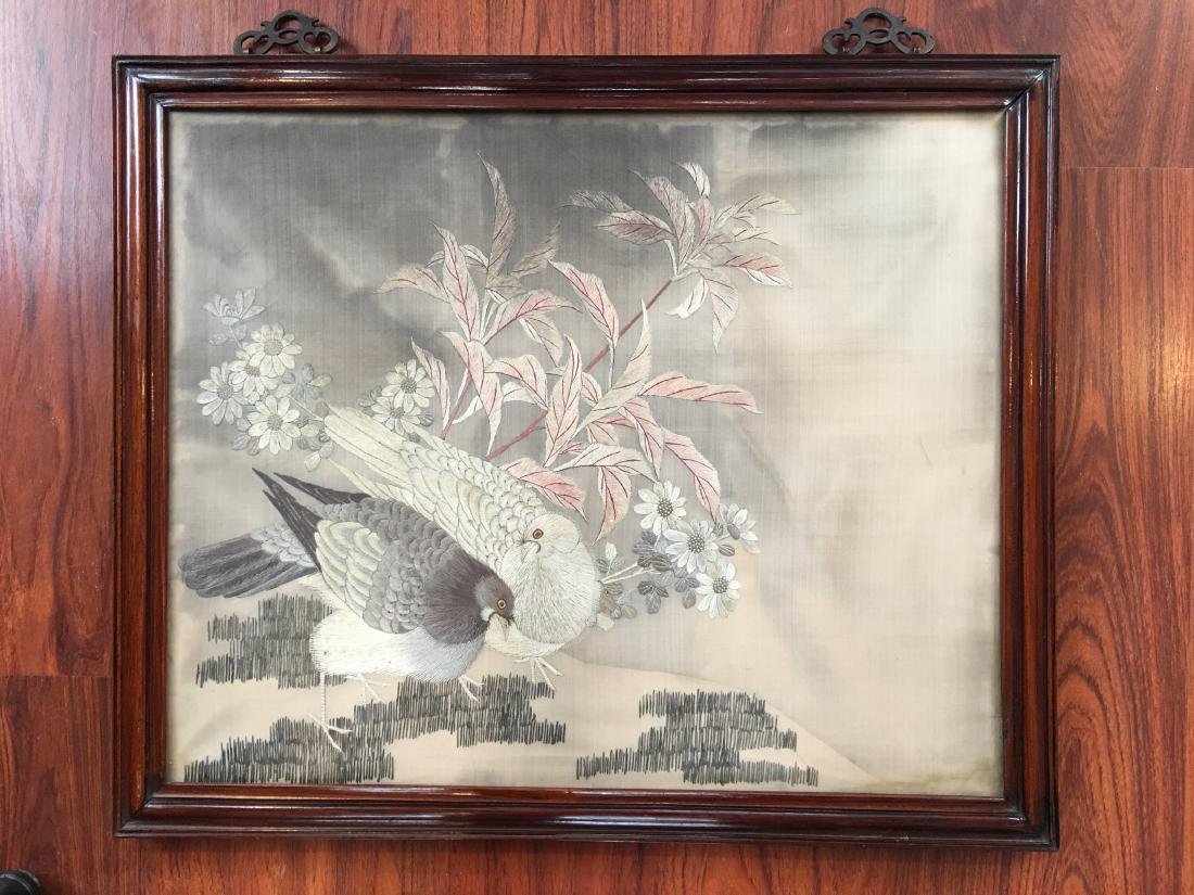 A CHINESE EMBROIDERED SILK PANEL WITH WOOD FRAME (1 of 3)