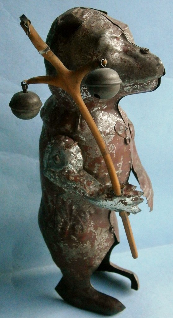 Turn of Century hand painted tin wind-up bear (1 of 5)