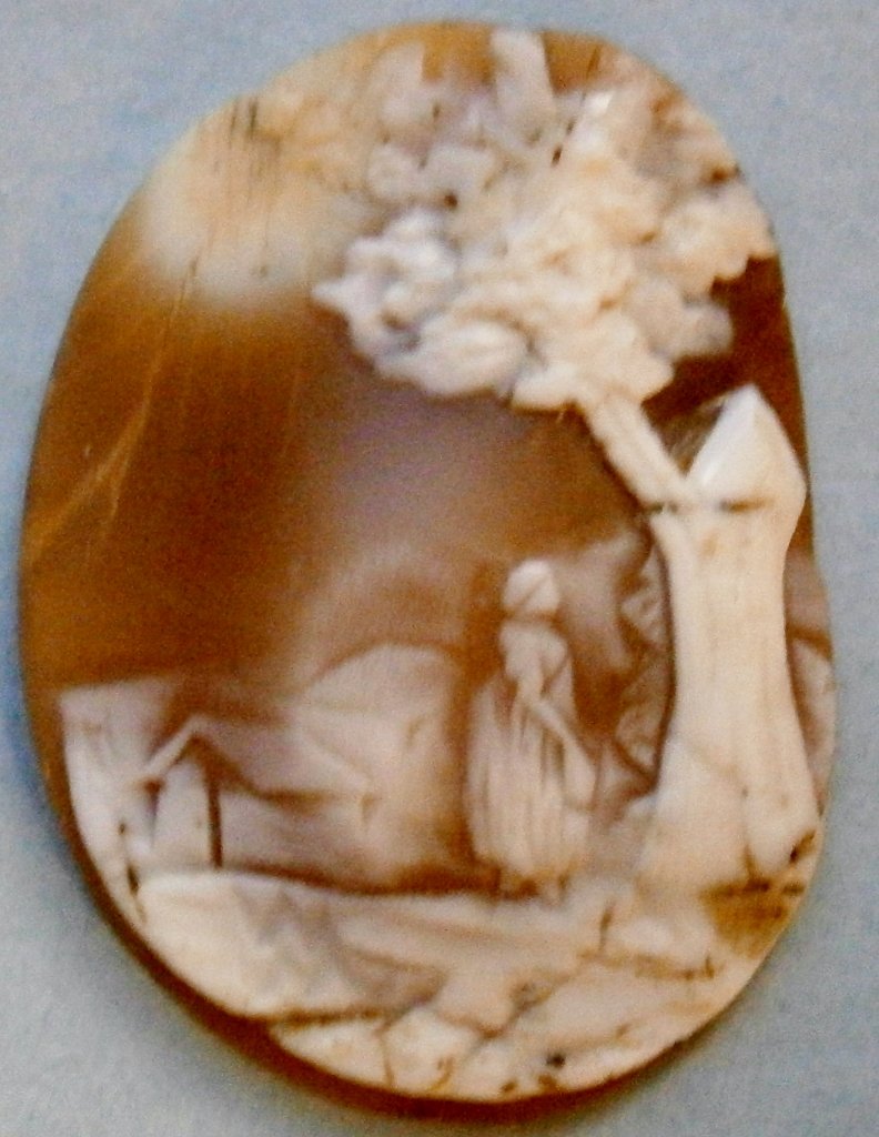 Large Unframed Old Scenic Shell Cameo from the early: Large Unframed Old Scenic Shell Cameo from the early 1900â€™s, 1 Â½ in. tall, nice detail with woman by tree and house, the dark spot on back is a natural blemish in the shell, the scenic ones 