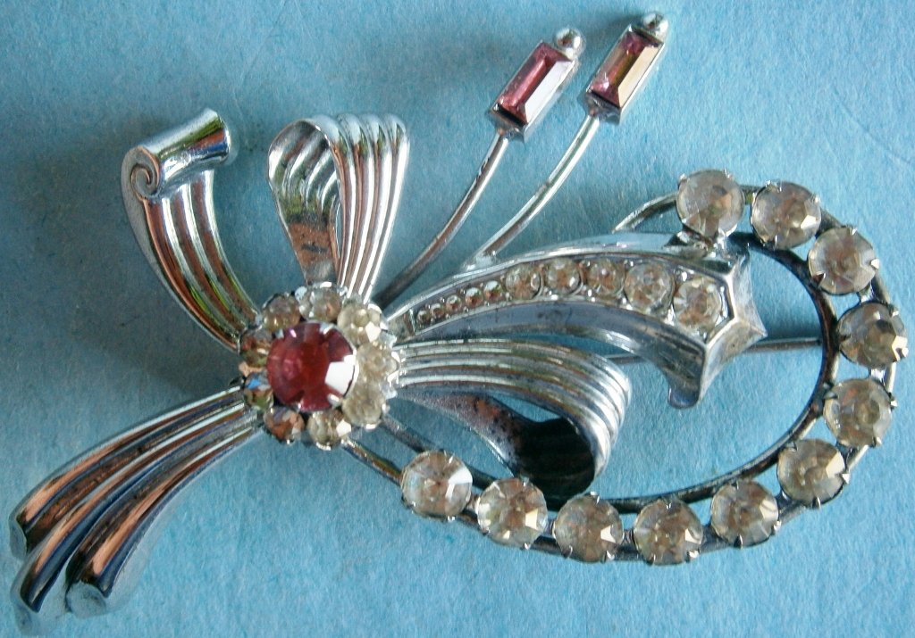 Henry Iskin Sterling Silver Pin with Rhinestones and: Henry Iskin Sterling Silver Pin with Rhinestones and Amethyst signed IH, c.1930-1954, 2 Â½ in. wide, complete, original finish.