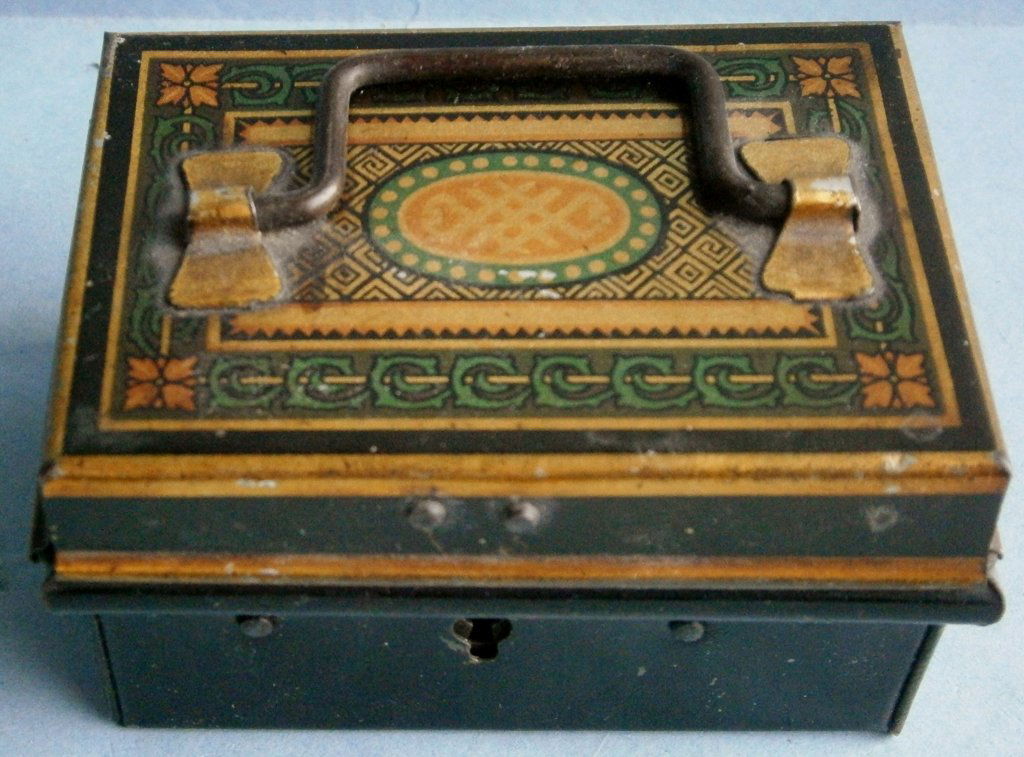Miniature antique decorated tin money box (1 of 7)