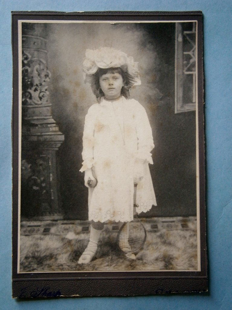 Cabinet Photo of Young Girl Holding Tennis Racket (1 of 4)