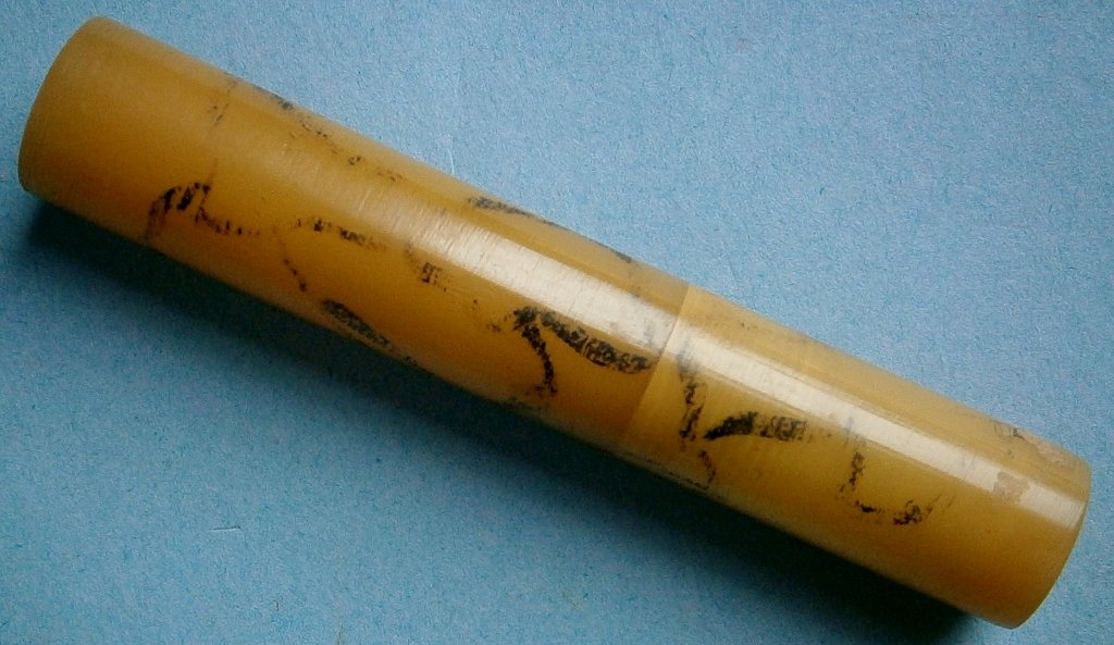 Marbleized Bakelite Needle Case: Marbleized Bakelite Needle Case from the early 1900s, 3 1/8 in. long.