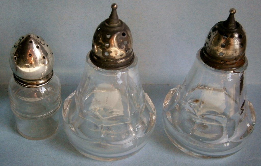 Set of Blown Glass in Mold Salt and Pepper Shakers: Set of Blown Glass in Mold Salt and Pepper Shakers with sterling tops, plus one odd shaker.