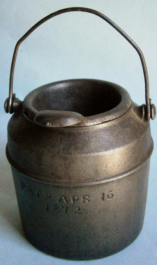 19th Century Cast Iron Glue Pot, Patented April 16,: 19th Century Cast Iron Glue Pot, Patented April 16, 1872, 3 1/4 in. tall excluding wire bail, usually missing the insert.