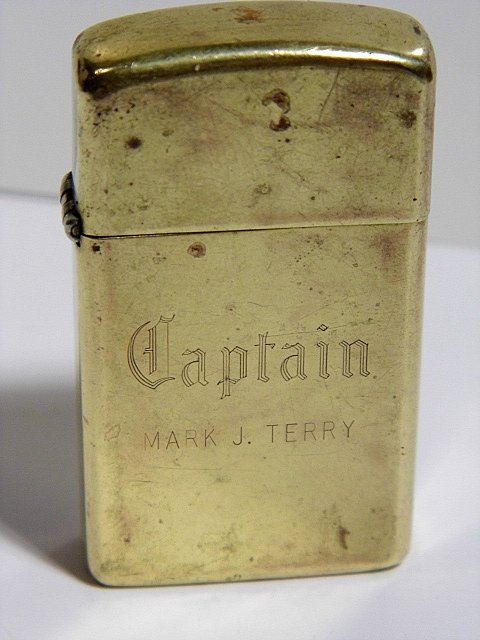Vintage Inscribed Calligraphy Zippo Lighter 1932-83: Old English calligraphic incription Captain Terry. Appears very good working condition. Just needs fluid.