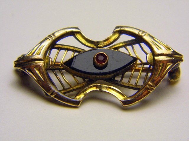 Victorian Jet Glass Memorial Pin: Small Victorian pin with a tiny spinel mounted atop a jet glass stone.