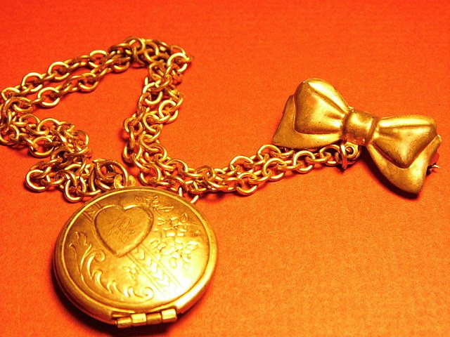 Chatelaine Pin & Double Locket M: Has a faint M monogram. 22 inch chain.