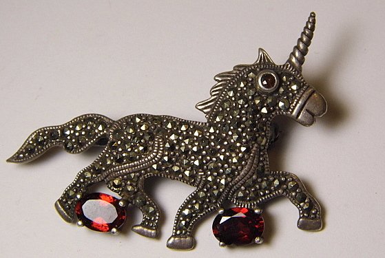 Vintage Sterling Silver Marcasite Garnet Brooch Unicorn: Finely cut garnets. Marked 925. Good condition.