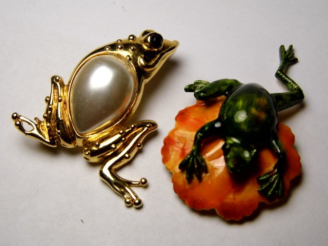 Designer Costume Frogs Anyone?: One mark unknown. Frog on orange lilly pad says original by Robert.