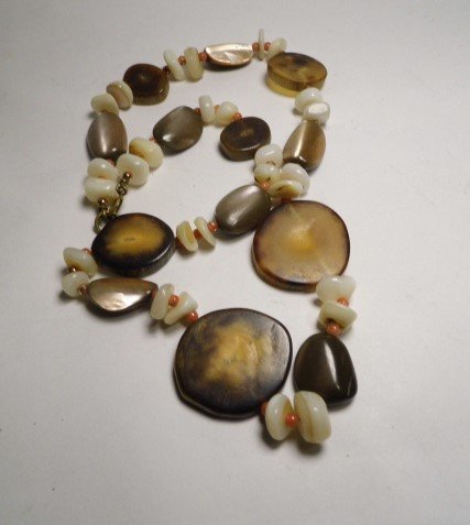 Quality Antler Fetish Necklace 18 inches: Antler disks, teeth and coral spacer beads. Animal skeletal elements usually not consumed by predators, eventually becoming part of the soil, as will this necklace.