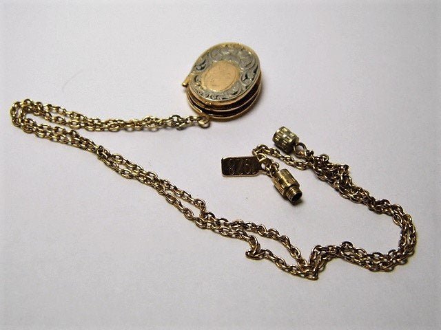 Locket Necklace 18 Inch chain: 1928 brand. Not year 1928. Circa 1990. Very popular brand name. Collectible.