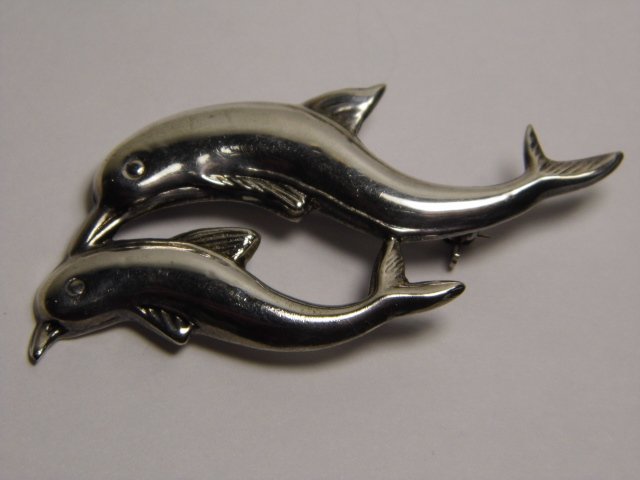 Signed BU Sterling Silver Brooch Dolphin Pair: Marked initials BU and 925 for sterling silver. Here is a link to the assumed designer, Mary Sterafore. https://www.thegivingtreegallery.com/jewelry/shop-by-designer/b-u-jewelry/