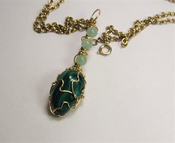 Large Malachite Aventurine Pendant Necklace: Attractive modern expressionist style. 20 inch chain. Pendant has 2 1/4 inch drop. Like new condition.