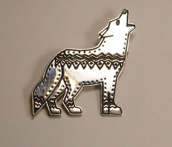 Unique Sterling Silver Brooch Howling Wolf Mexico: Has a copyright symbol and sterling silver mark. Fine condition. High polish heavy silver.