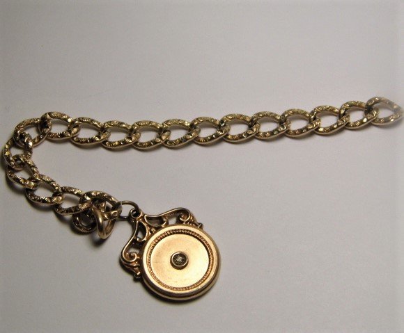 Victorian Antique Gold Plate Watch Fob: 9 inches total length.