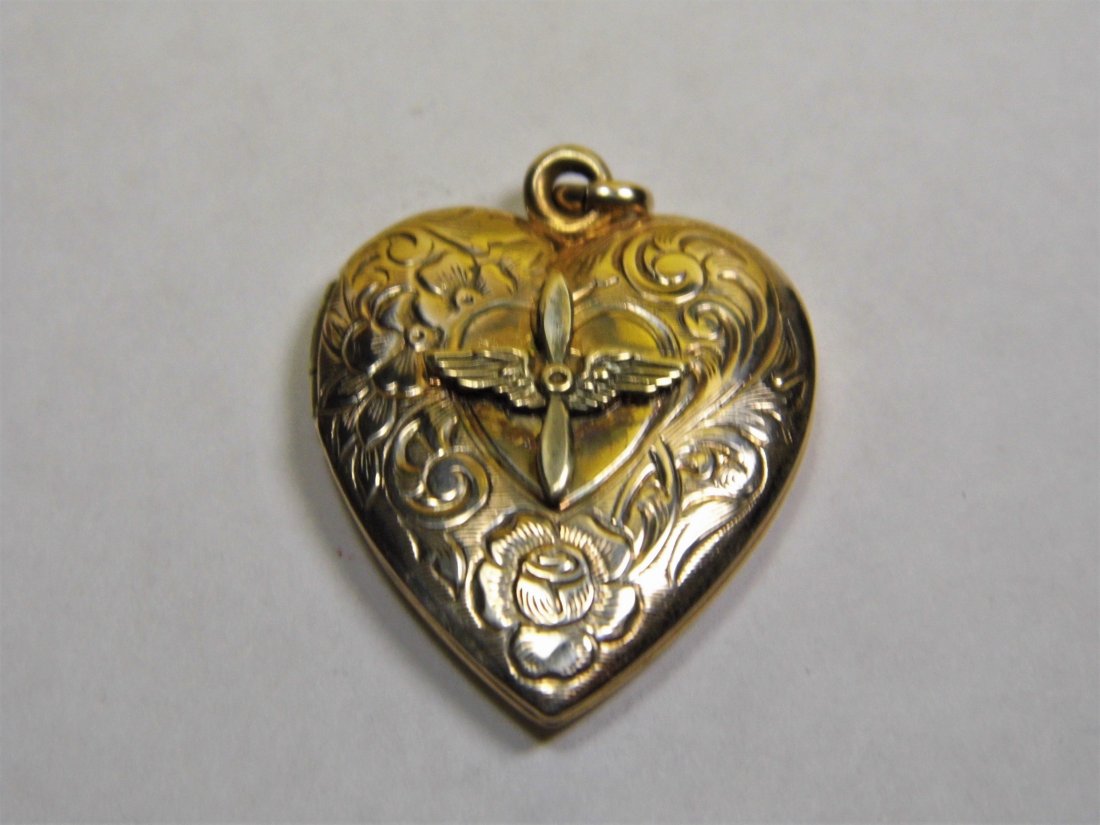 Vintage Gold Plate Heart Locket Wings & Propeller: Has gold filled marks interior on edge of panel. Good clasp. Snaps shut.