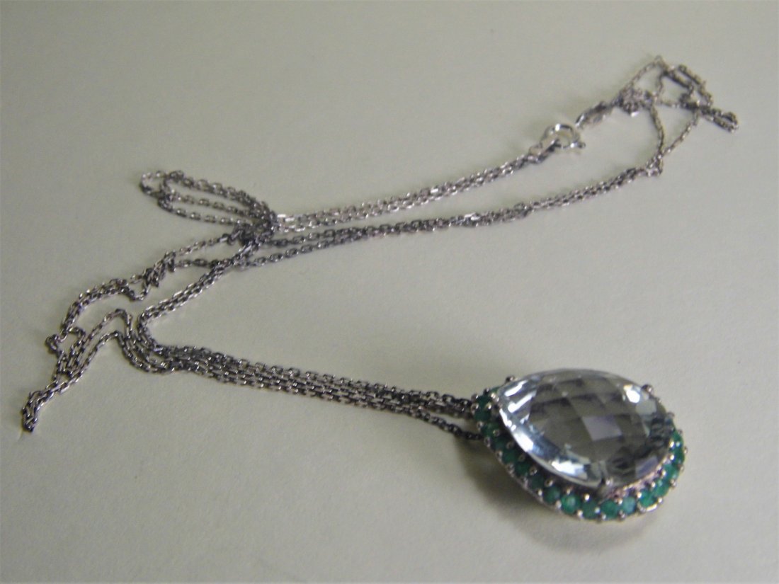 Pear Shaped Cut Citrine Pendant Necklace: Beautifully hand cut stone. Hardness tested exhibiting faint lime color. Emerald colored stones are fluorite. Both mount and double strand chain marked for sterling silver and a maker mark appears as