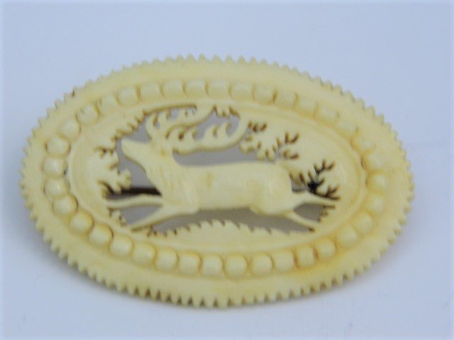 Antique Carved Bone Scottish St Hubertus Brooch: Finely carved forest deer, object of St Hubert's vision. Probably elk or deer bone. No damage. Good clasp. Here is link to St Hubert, patron saint of hunters: https://en.wikipedia.org/wiki/Hubertus