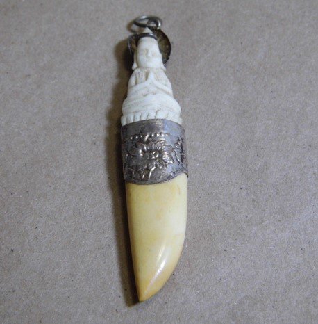 Antique Raj Era Necklace Pendant Buddha Crocodile: Tooth in good condition both sides. Finely carved praying buddha. Silvergilt band also good. Loop and bail for chain.