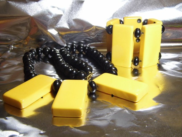Vintage Bakelite Domino Demi-parure Bracelet Necklace: 1980's pair in very good condition. Necklace 18 1/2 inches. Expandable bracelet 7 1/2 inches up.
