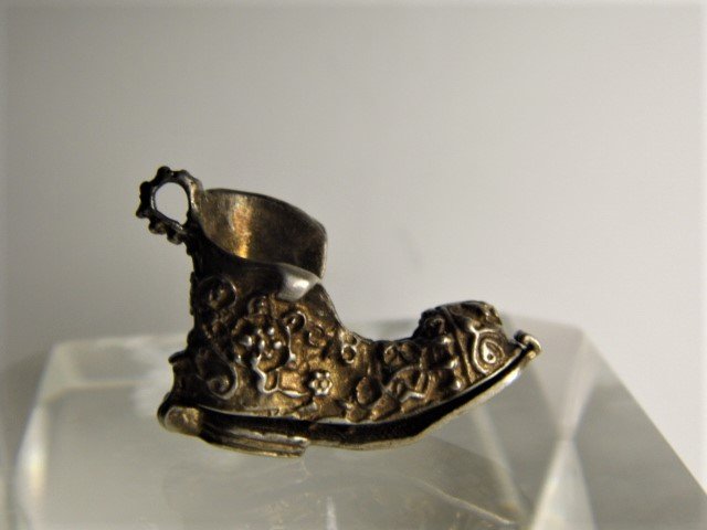 Vintage Mechanical Silver Bracelet Charm Boot: Really cool. Vagabond with dog inside shoe. Good condition. Nice patina. Closes tightly shut.