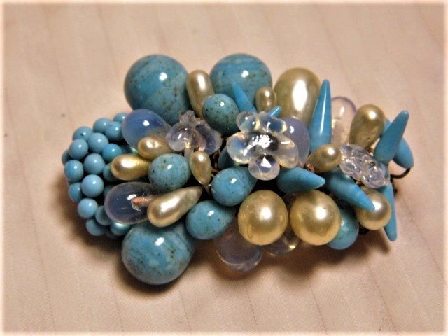 Vintage French Costume Brooch Moonstone Glass: Pretty blue hues. All glass good. Clasp good. Marked Made in France.