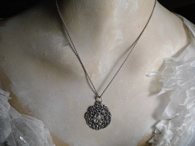 Antique French Rocaille Necklace Pendant: Converted French button. Large bail for chain. Chain doesn't match very well. Only for display. Can be included for $15.