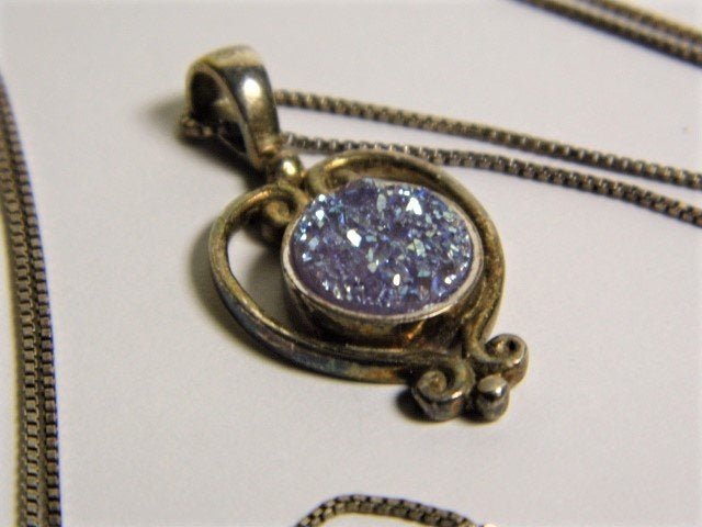 Signed Sajen Blue Druzy Sterling Silver Necklace Bali: Sajen, 1987 North American jewelry company incorporating Asian/Indonesian influence. With hallmarks. 30 inch sterling silver chain with silver marks.