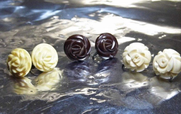 Three Pair Vintage Earrings Bakelite Bone: The first pair are a fine bone, possible a tooth of some sort, not elephant ivory. The chocolate pair are Bakelite and the third pair are an early resin. All screw backs are good.