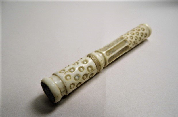 Antique Asian Carved Necklace Pendant Needle Case: Cute Victorian era element. Still threads shut well.