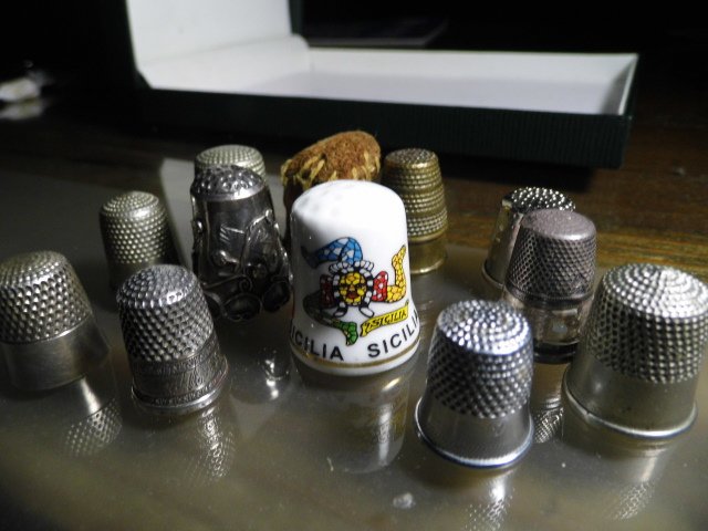Dozen Vintage Thimbles Sterling Silver Porcelain Brass: All good condition. No holes. A few are signed.
