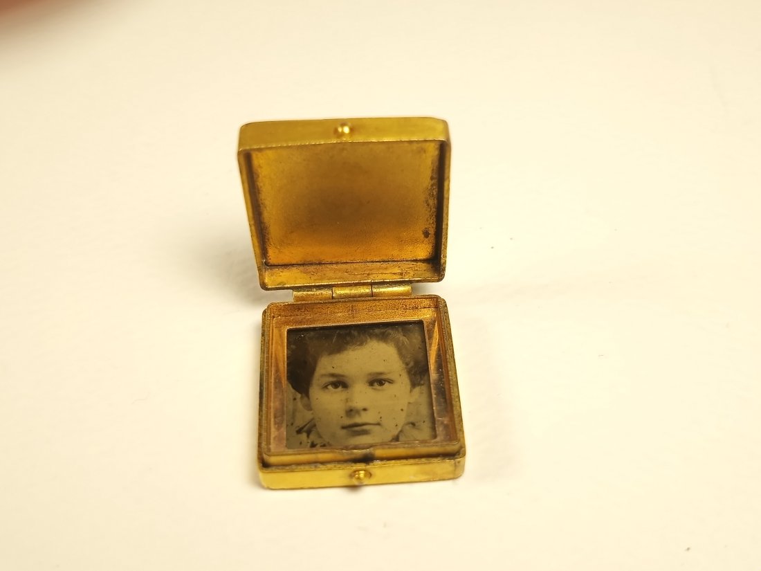 Antique Victorian Necklace or Charm Locket: Gold plating has loss. Very sturdy, good hinge. Interior good.