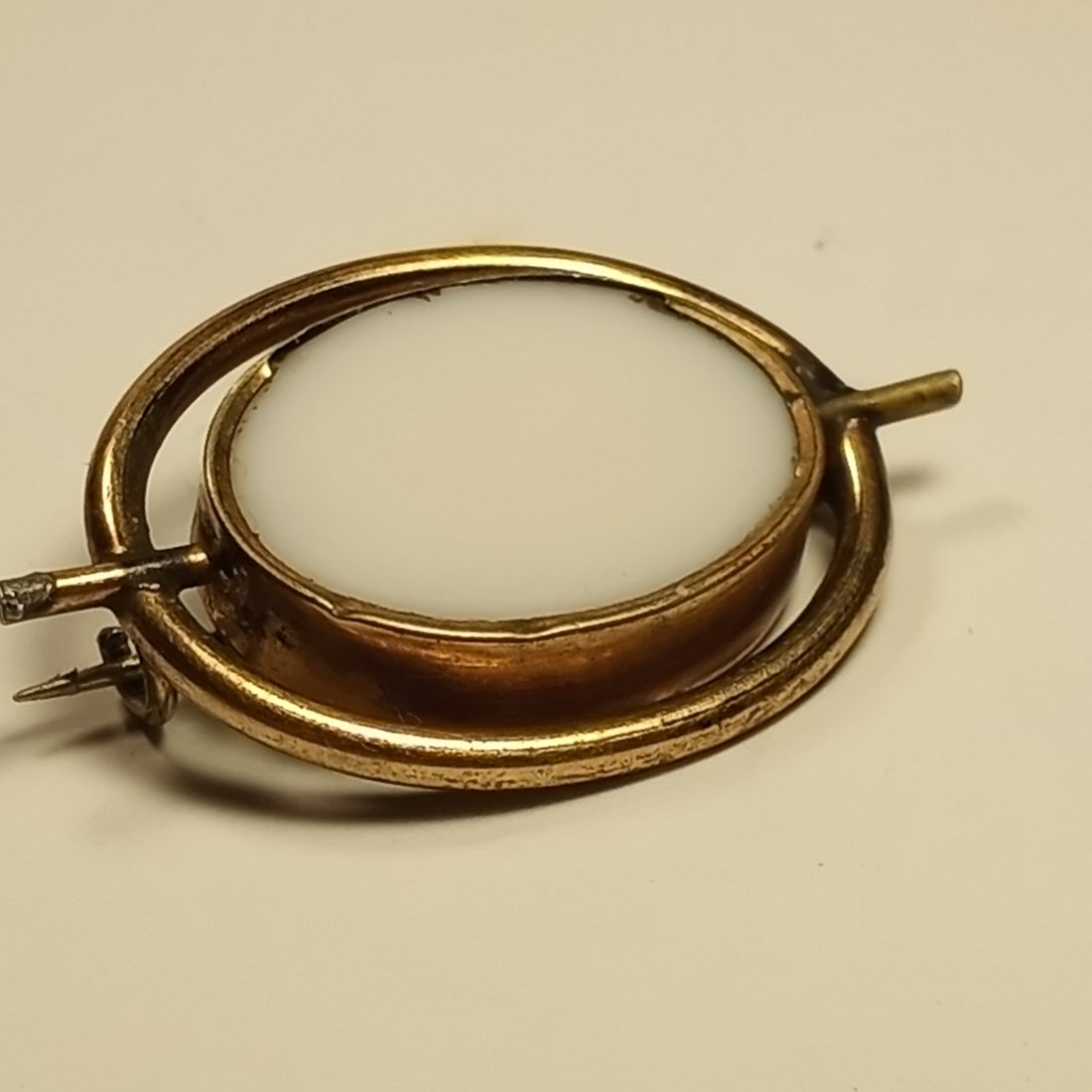 Victorian Rare Swivel Mourning or Memorial Pin: One side is milk glass. The opposite side is a face for mourning hair or photo.