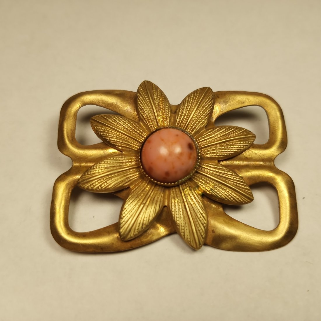 Interesting Edwardian Antique Brooch: Unknown stone. Perhaps rhodonite. Good condition.