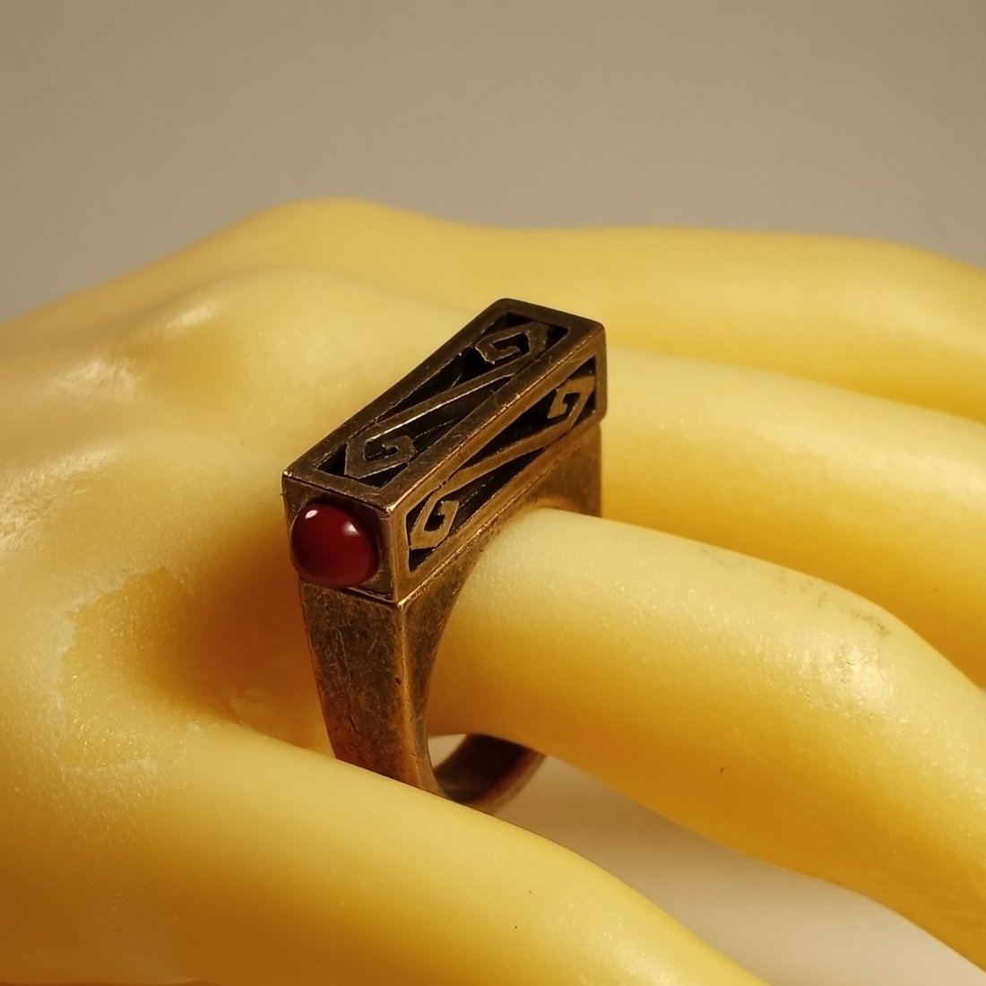 Beautiful Givenchy Vintage Bronze Ring 8 1/4: Hubert de Givenchy. Founded 1952. Ring has a couple of stones. Appear to be rich color carnelian stones. Marked inside band.