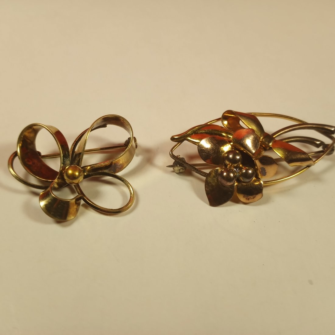Pair Carl-Art Brooches ca 1950's 12 karat Gold Filled: Here is a link to info about Carl-Art, begun in 1936 to about 1980. http://danielleoliviatefftwrites.com/found-in-the-jewelry-box-blog/have-you-heard-of-carl-art-costume-jewelry