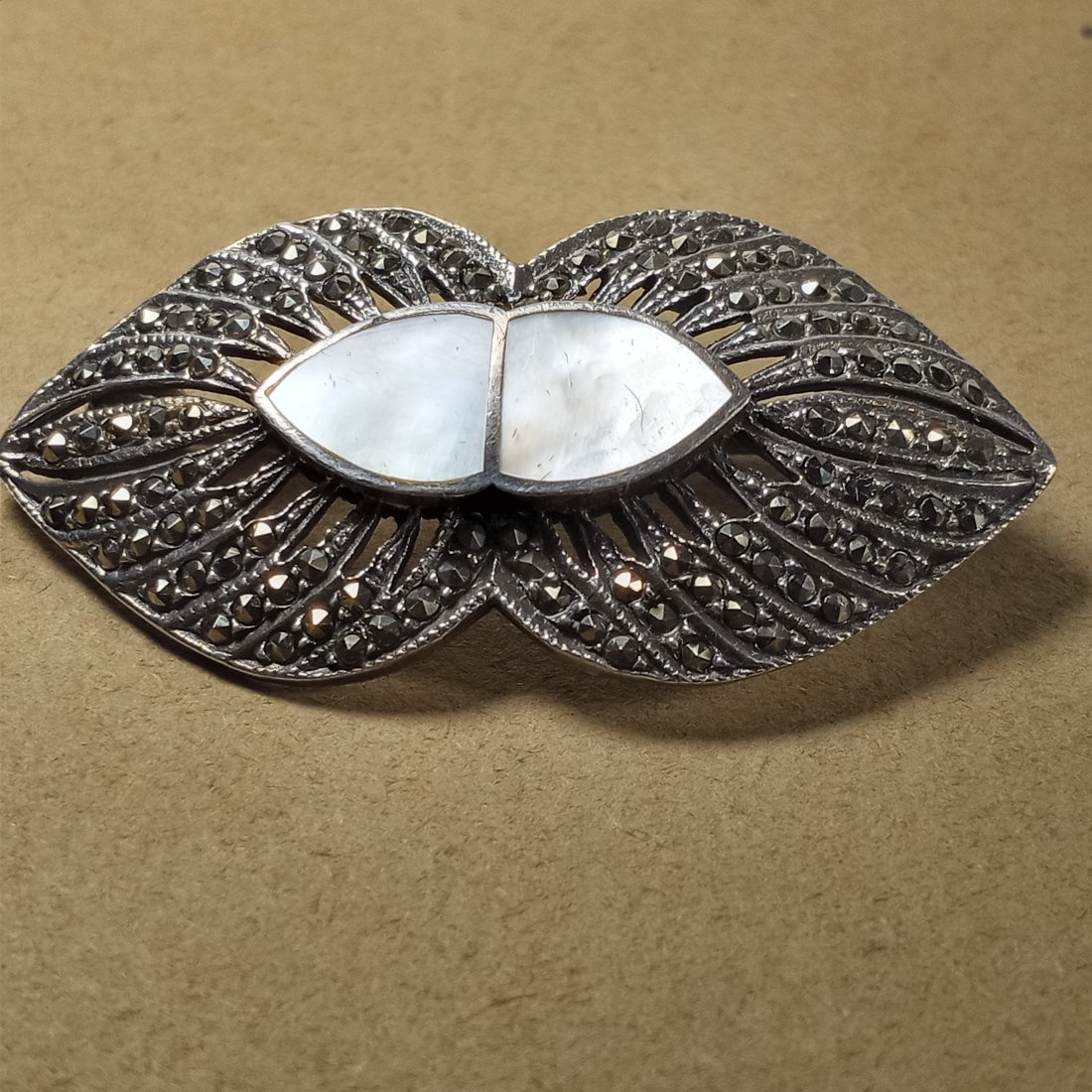 Antique Silver Marcasite and Mother of Pearl Brooch Pin: No missing marcasite. Fine condition for age.