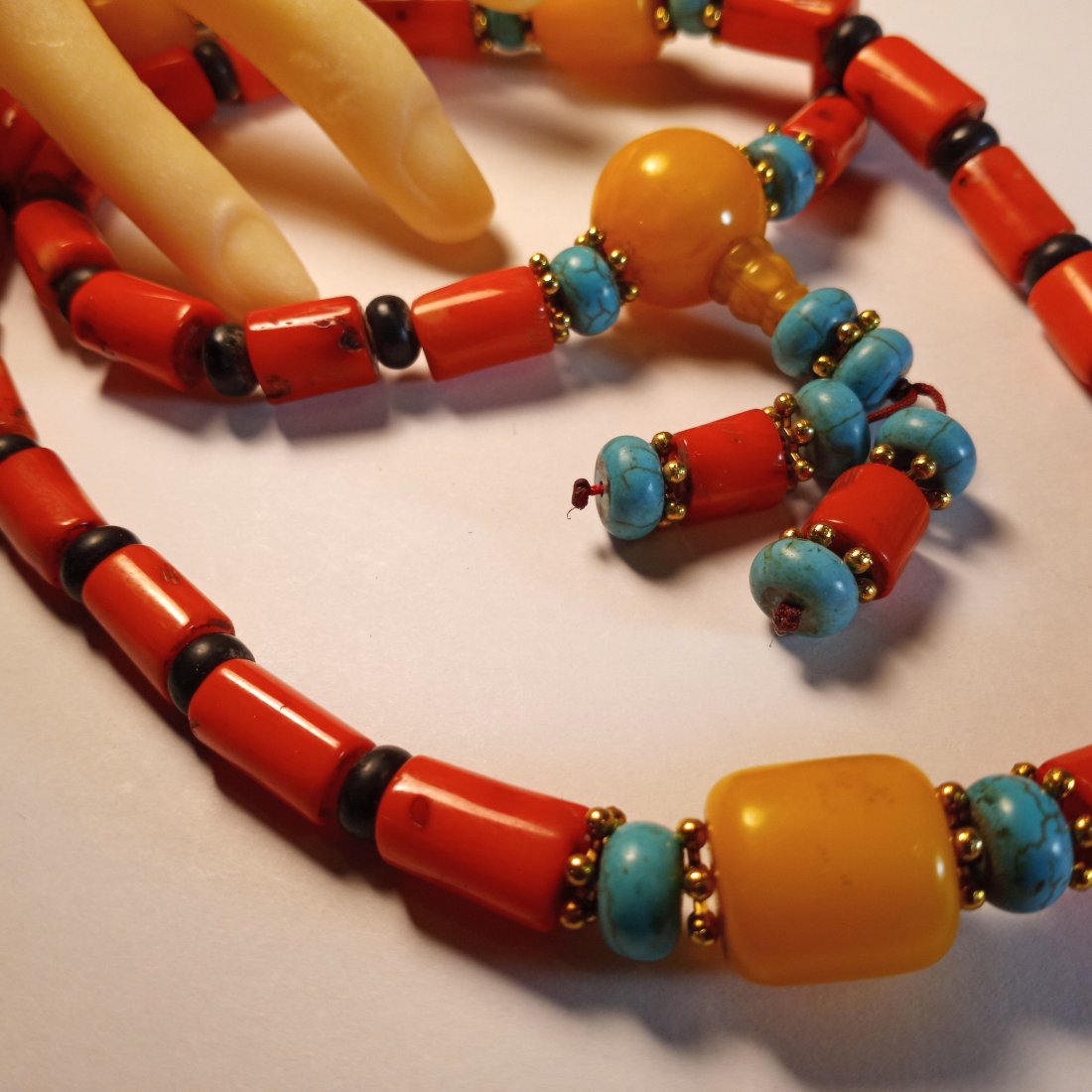 Beautiful Colorful Vintage Bold Coral and Turquoise Necklace: Probably 60's to 80's. Enhance red and yellow coral. Genuine. Coral this size is no longer made. Coral harvesting is mostly illegal throughout the world today. 30 inches.