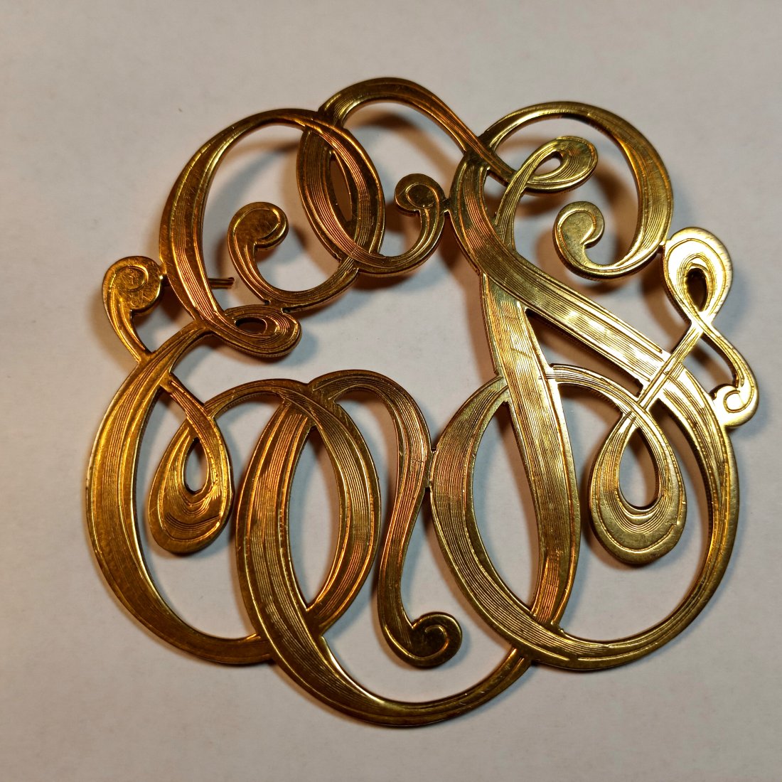 Large Custom Three Letter Calligraphy Monogram Brooch: Incised details on letters. ETS or TES, but maybe not STE. Can't go backwards...unless you want to.