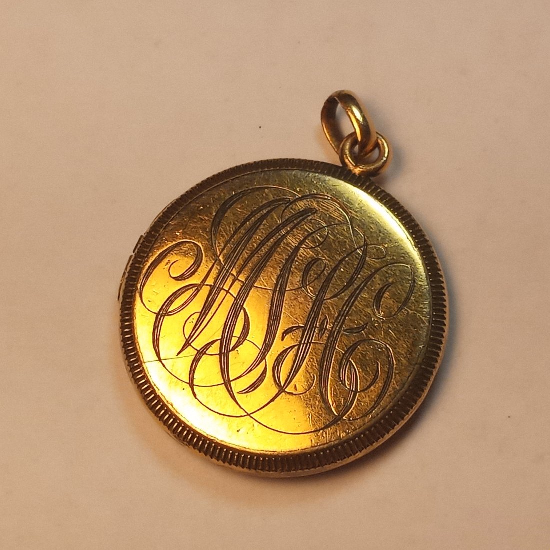 Victorian Era Gold Plated Locket Pendant Calligraphy Engraved: Marked SBC Co. for SB Champlin Company in Rhode Island, founded 1872. Here is a link to information about the jewelry maker. https://guide.ppsri.org/property/champlin-mfg-co