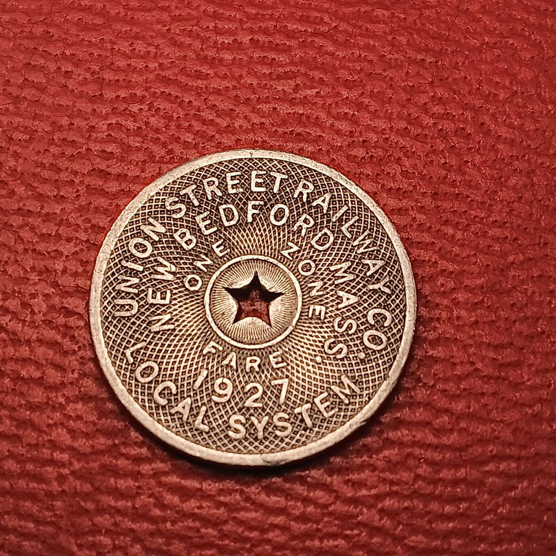 Exonumia. Union Street Railway New Bedford Fare Token: 1927 issue. Numista rarity index 89.