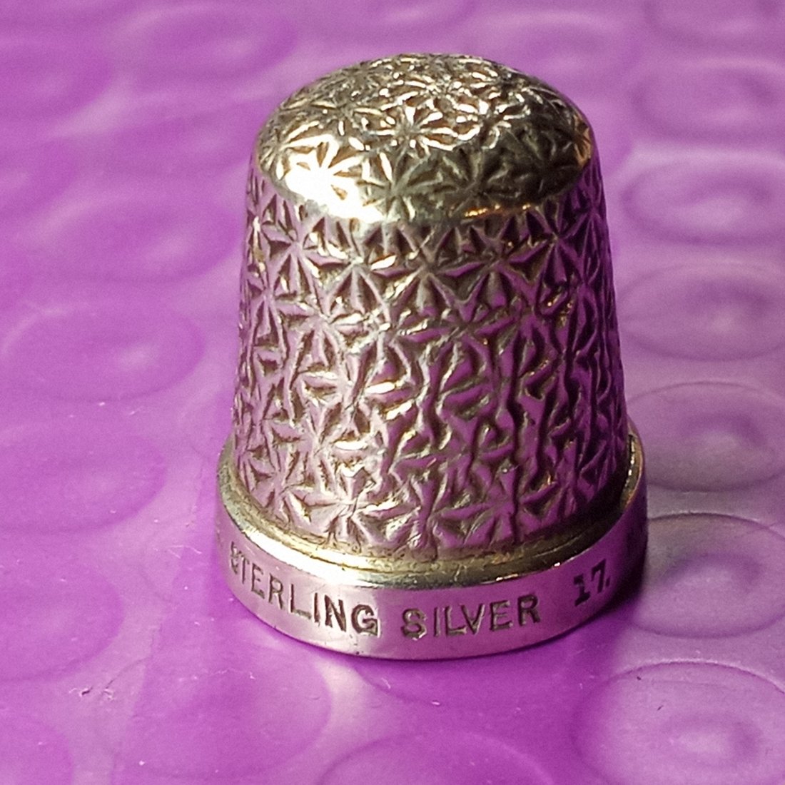 Antique Sterling Silver Thimble: Made in England. Marked sterling silver.