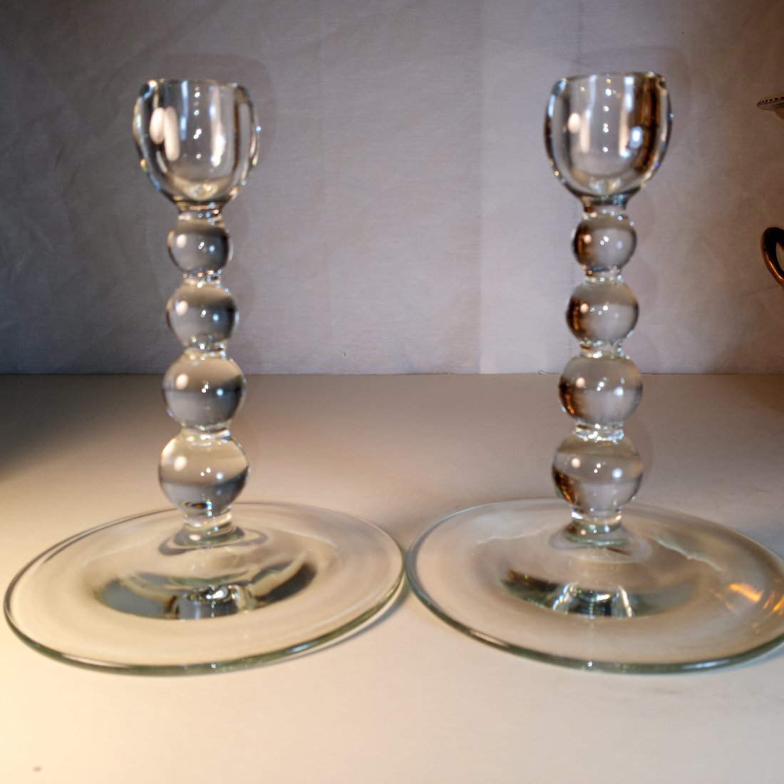 Pair Candlewick Crystal Candlesticks: One has a fleabite on the lip. Otherwise great. Candlewick is classifed as crystal, unlike most other American pattern glass.