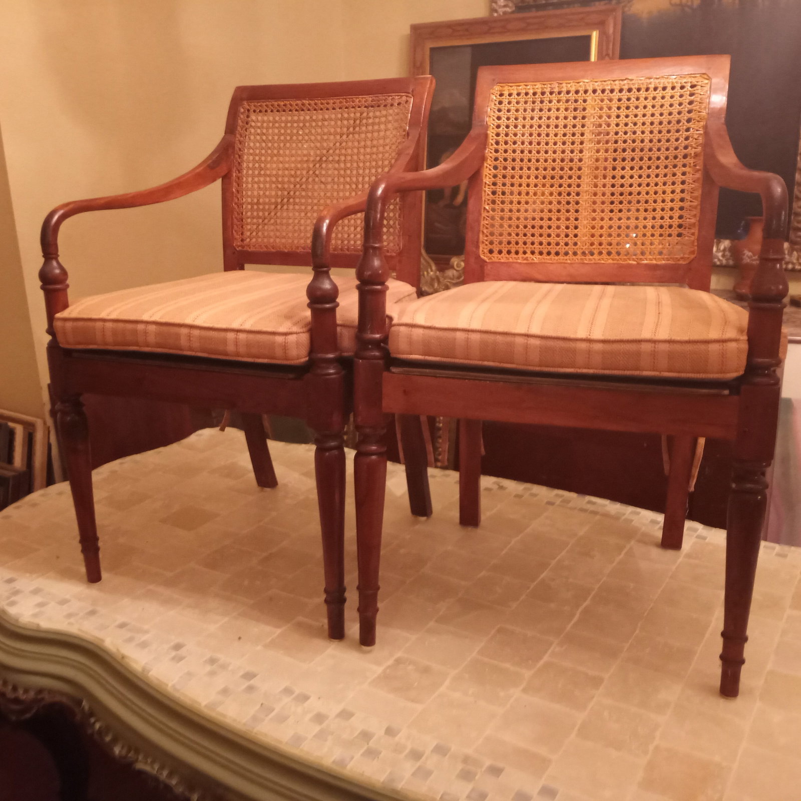 Pair of Louis XVI Fruitwood Dining Chairs Hand Laced Cane Seats: His and her dining chairs...one is a little smaller than the other. Very good condition. Cane intact.