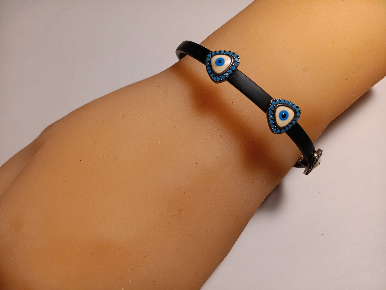 Unique Exquisite All Seeing Eye Gothic Bracelet: Metal parts are sterling silver. Super tiny pronged in blue stones. 6 1/2 inches end to end.